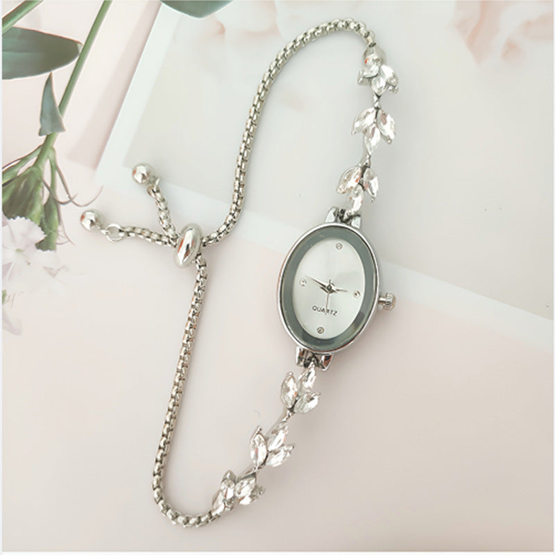 Elegante Damenarmbanduhr mit Blätter-Design
