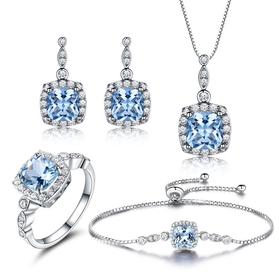 925 Sterling Silber Schmuckset mit Himmelblauer Topas Halskette (Vierteilig)