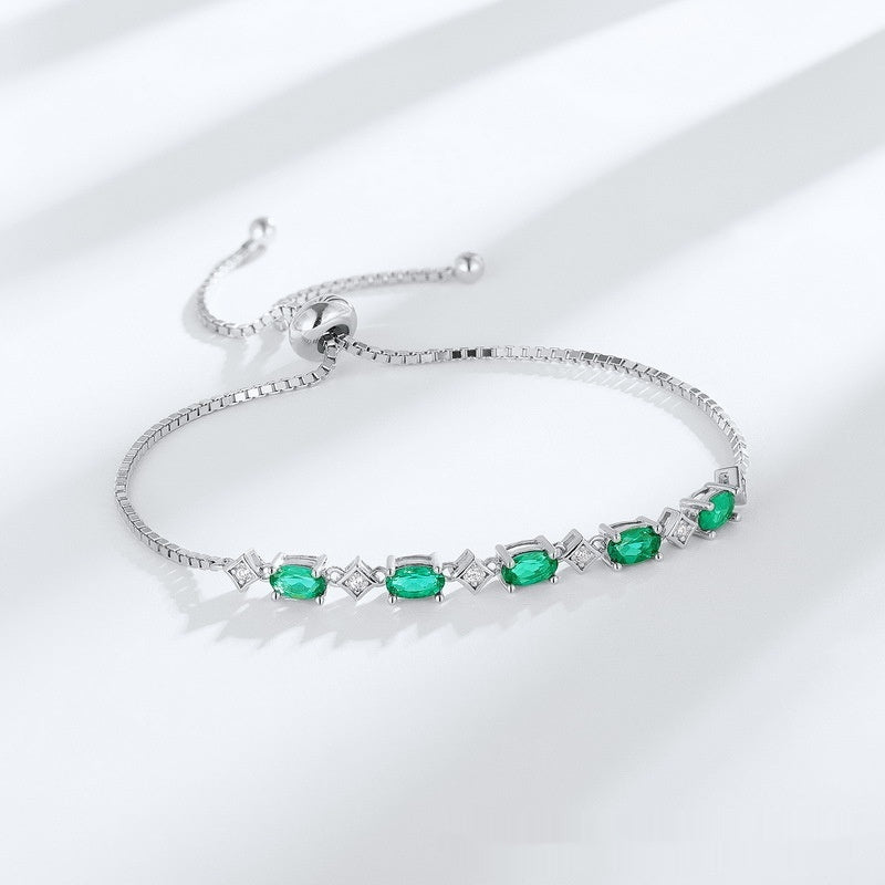 Zartes S925 Silberarmband mit eiförmigen Smaragd-Steinen