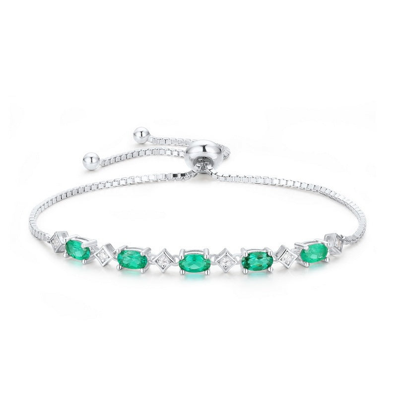 Zartes S925 Silberarmband mit eiförmigen Smaragd-Steinen